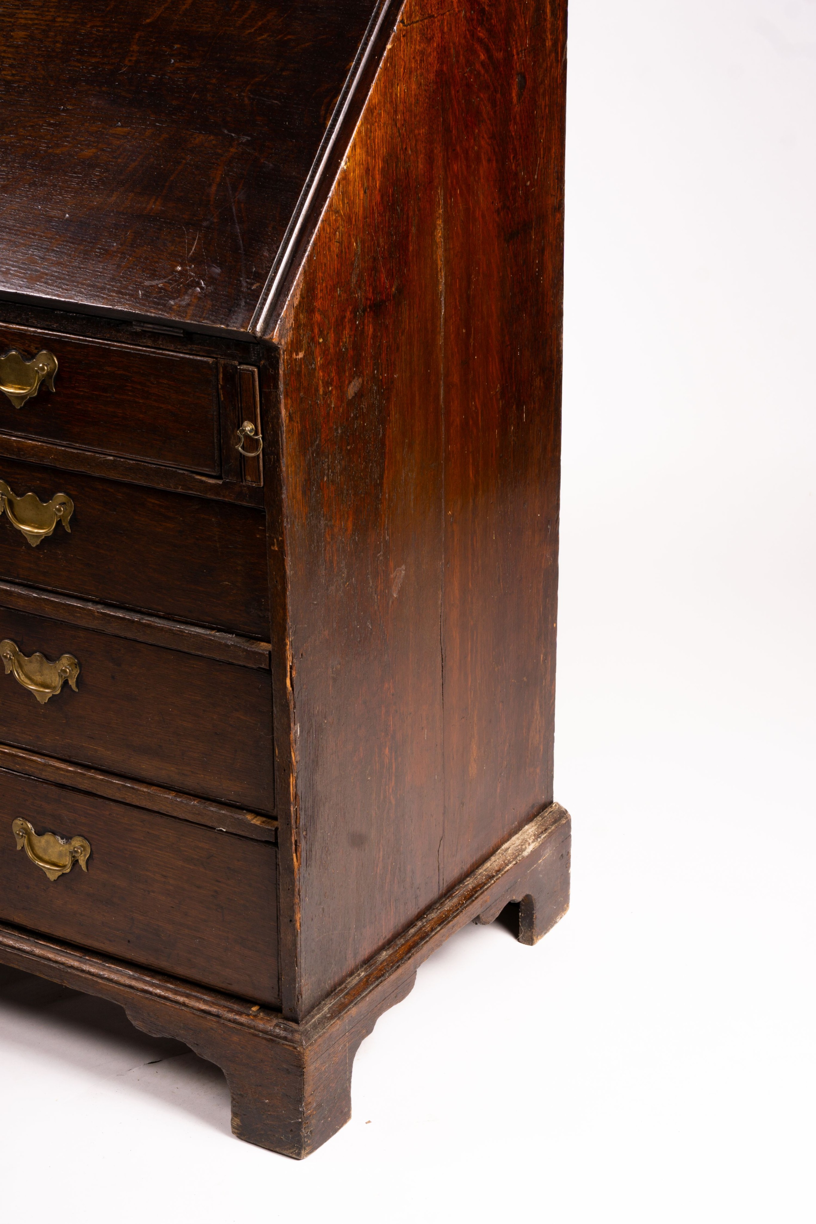 A George III oak bureau cabinet, width 108cm, depth 52cm, height 209cm